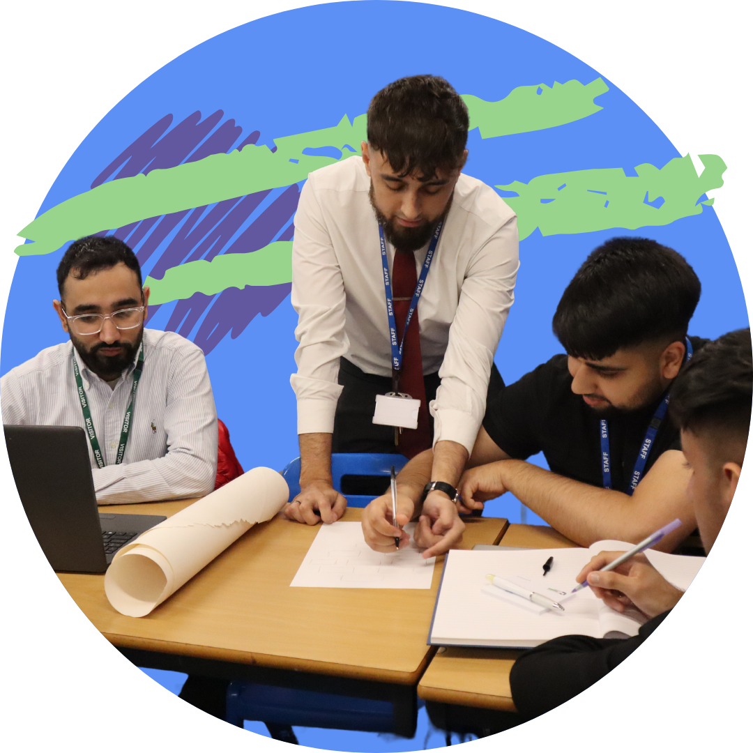 Secondary trainee teacher working with pupils in a Bradford classroom